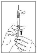 Hand holding an injection device with a needle inserted into the skin, arrow indicates direction of insertion