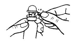 Hands holding an injection device with a visible needle preparing for administration