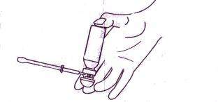 Hand holding an auto-injector with exposed needle ready for subcutaneous injection