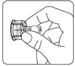Hand holding a preloaded syringe with the plunger up and the needle exposed, ready for injection