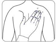 Hand applying pressure with fingertips on the injection site on the upper arm