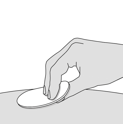 Hand applying a cotton ball soaked with liquid to a round area of skin for disinfection