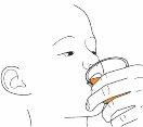 Hand holding an oral inhaler orange with the mouthpiece near the lips and nose