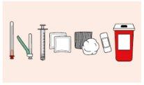 Syringe, needle, alcohol swabs, sterile gauze, cotton, and red container for puncture-resistant objects lined up