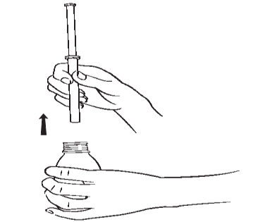 Mano che afferra una fiala di vetro con un tappo, mentre l