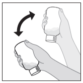 Mani che ruotano un flaconcino medicinale trasparente con liquido all