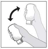 Mani che ruotano un dispositivo medico cilindrico con indicazione freccia e base scanalata per facilitare la presa