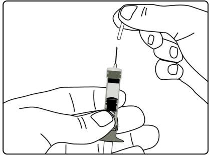 Mano che tiene una siringa preriempita con ago rivolto verso il basso e un dito che stabilizza l