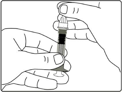 Mano che tiene una penna per iniezione pre-riempita con ago trasparente collegato e pulsante sporgente