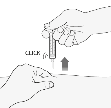 Mano che tiene una siringa preriempita con l