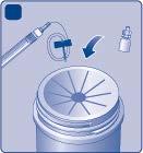 Fiala con tappo blu, siringa e ago pronti per l