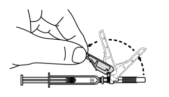 Mano che tiene una siringa pronta per l