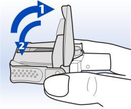 Dispositivo autoiniettante tenuto in mano con freccia blu che indica il movimento del pistone per l