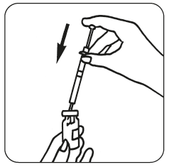 Mano che tiene una siringa pronta per l