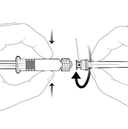 Siringa con ago avvitato e freccia che indica il movimento di rotazione per il fissaggio corretto