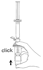 Mano che tiene una siringa pronta per l