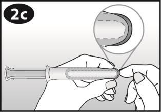 Mano che tiene una siringa preriempita con l