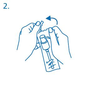 Mani che tengono e ruotano un dispositivo penna con un ago visibile e un pulsante di rilascio premuto indicato da una freccia