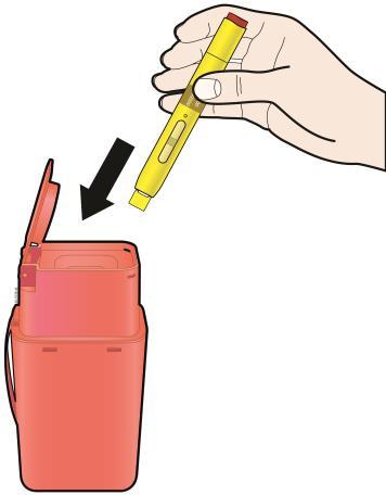 Penna per iniezione gialla in mano con freccia nera che indica l