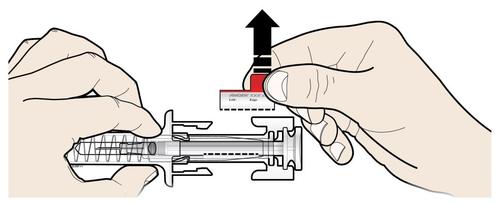 Dispositivo di iniezione con cartuccia rossa inserita e pulsante premuto con freccia direzionale verso l