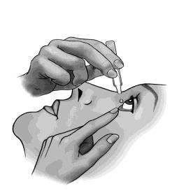 Mano che tiene un contagocce sopra l