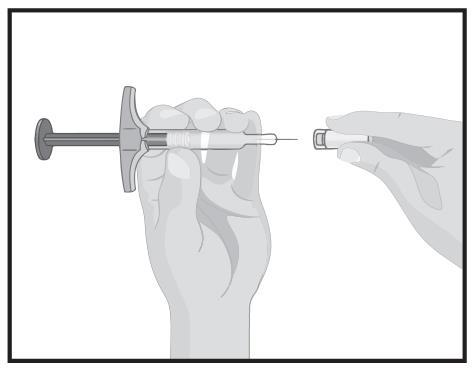 Mano che tiene una siringa pre-riempita con ago esposto e un cappuccio protettivo separato accanto