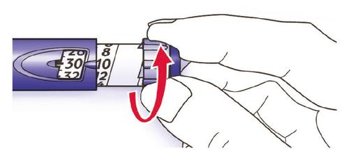 Mano che ruota il selettore di dosaggio su una penna iniettabile graduata da 8 a 32 unità con freccia rossa indicante la direzione