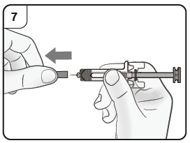 Mano che tiene la siringa preraempita con l