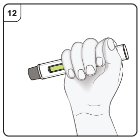 Mano che stringe un dispositivo penna per iniezione con indicatore verde visibile e pulsante di rilascio pronto all