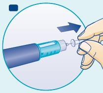 Penna iniettabile blu con ago trasparente e mano che la tiene pronta per l