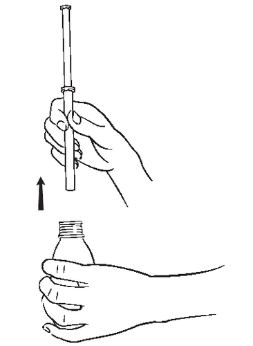 Mano che afferra una fiala di vetro con un dito mentre un