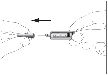 Mani che tengono una siringa prerafillata con l