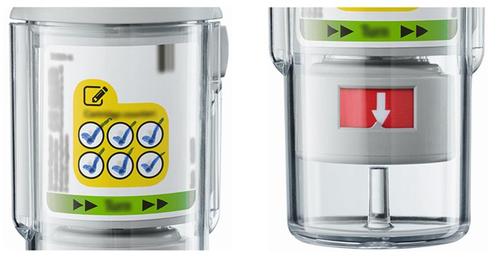 Fiala trasparente con etichetta gialla e simboli di spunta blu, frecce verdi e una freccia rossa su sfondo bianco