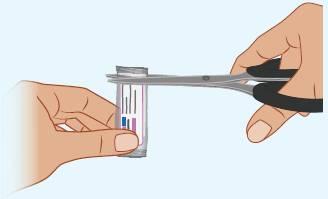 Mani che tagliano con le forbici l