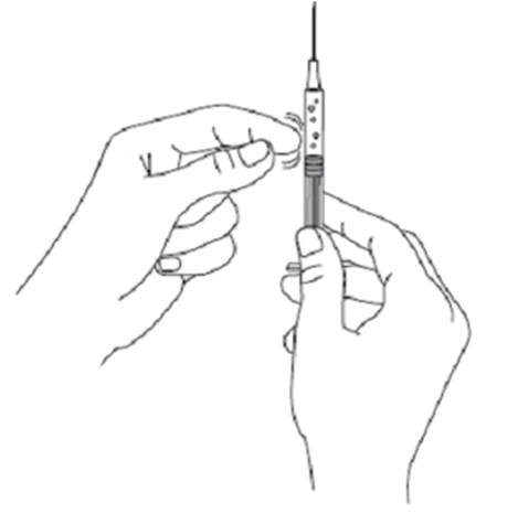 Mano che afferra una siringa pronta per l