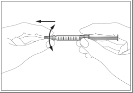 Mani che ruotano una siringa preriempita con ago trasparente per miscelare il contenuto prima dell