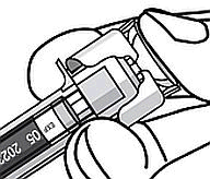 Penna iniettabile con scala graduata da 0 a 90 e indicazione 20-22, tenuta da una mano con pollice e indice