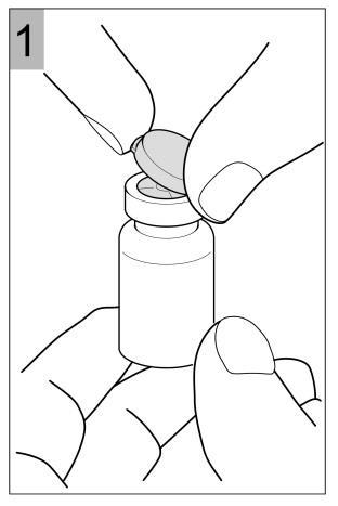 Mani che tengono un flaconcino medicinale con il tappo in fase di rimozione per l
