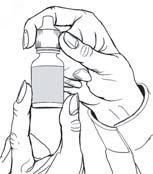 Mano che tiene una fiala di vetro con tappo blu, preparandosi per l