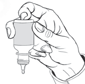 Mano che stringe un flacone contagocce con l