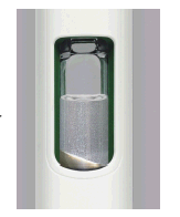 Fiala di vetro trasparente con polvere bianca e tappo metallico argentato all