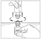 Fiala di vetro tenuta da una mano con un adattatore avvitato e una cartuccia collegata sopra
