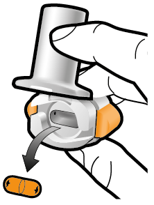 Dispositivo autoiniettante con capsula medicinale gialla che viene espulsa premendo il pulsante bianco superiore