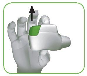 Mano che tiene un dispositivo medico bianco e verde con una freccia nera che indica la parte superiore