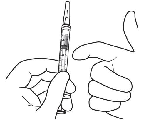 Mano che tiene una siringa graduata con ago, pronta per l