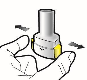 Mano che tiene un dispositivo medico cilindrico grigio e giallo con frecce che indicano la pressione laterale