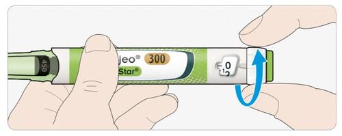 Penna iniettabile JEO 300 Star con dosaggio impostato a zero e freccia blu che indica la rotazione del selettore di dose tenuta da due mani