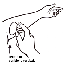 Mano che afferra la siringa con l