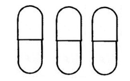 Tre capsule oblunghe bianche allineate orizzontalmente con una linea che indica il punto di rottura