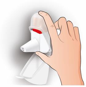 Mano che preme il pulsante bianco di un inalatore medico con una finestra rossa visibile